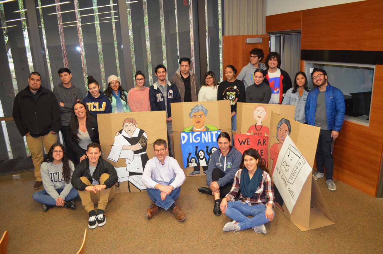 Students pose with historically themed creations