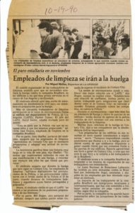 Browned copy of a newspaper clipping, with the date "10-19-90" written on it. The headline below reads "Empleados de limpieza se irán a la huelga (Cleaning Workers Go on Strike." It features images of janitors preparing to strike.